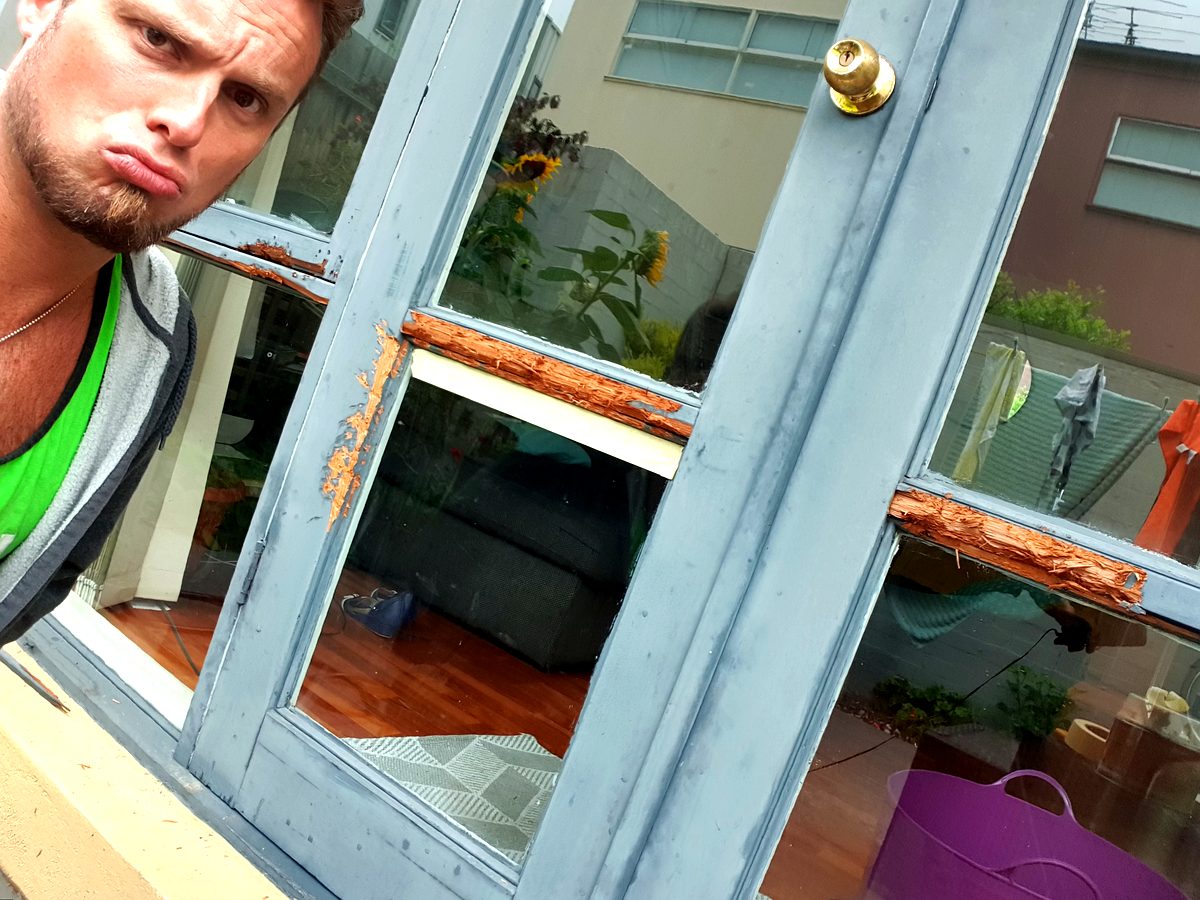 Mick assessing door rot damage