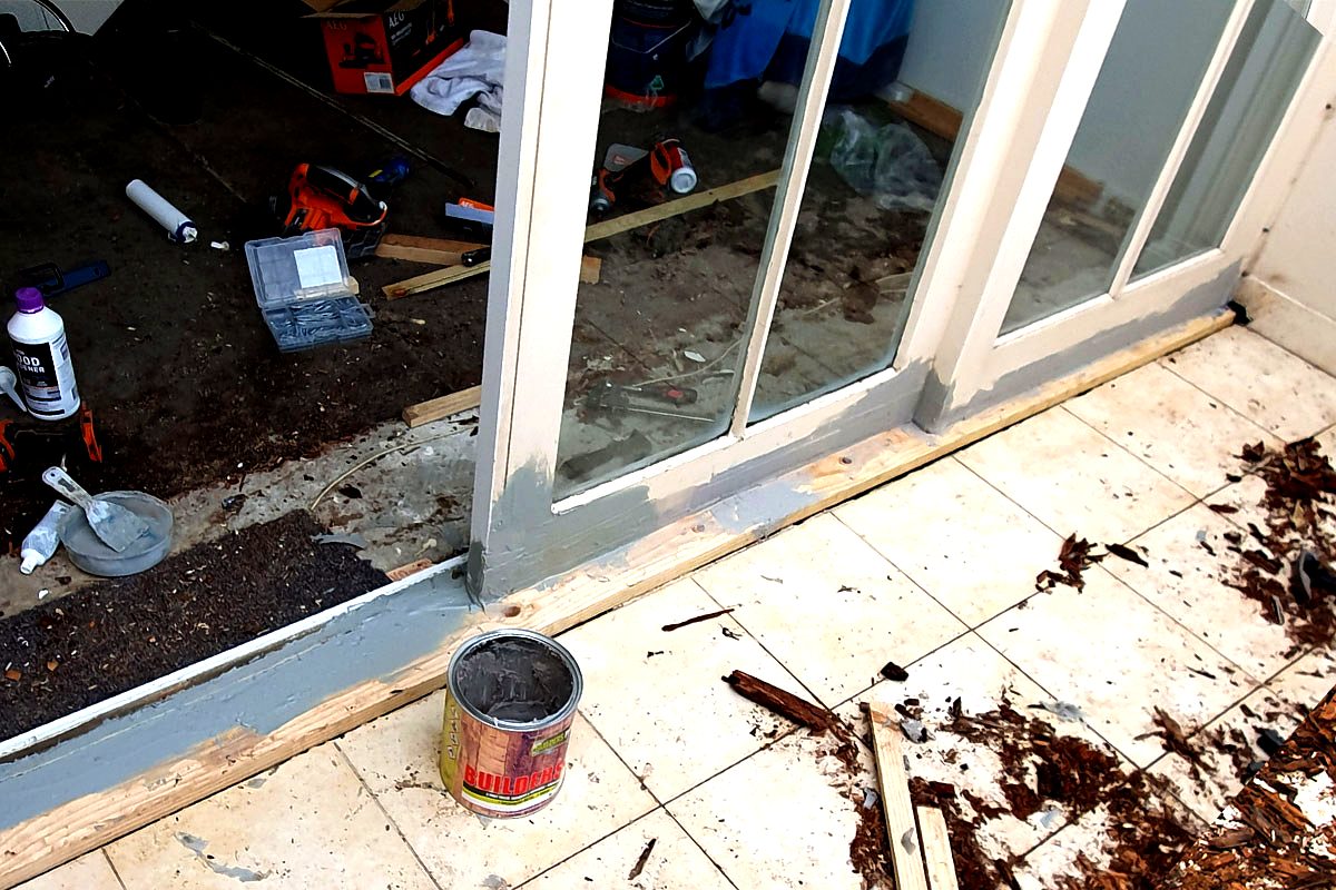 Sliding door rot repair in progress